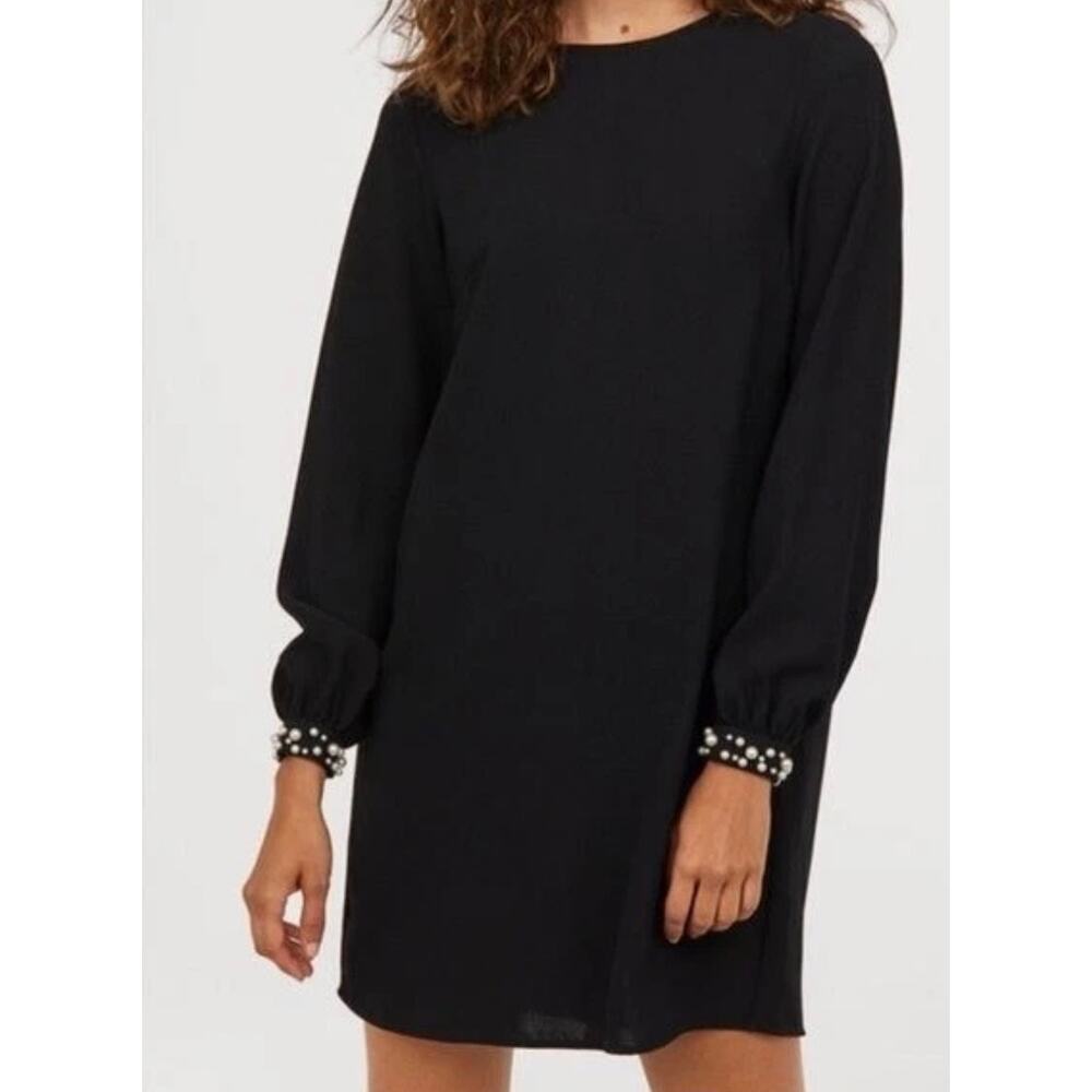 H&M black mini shift dress with pearl-cuffed long sleeve, size 10